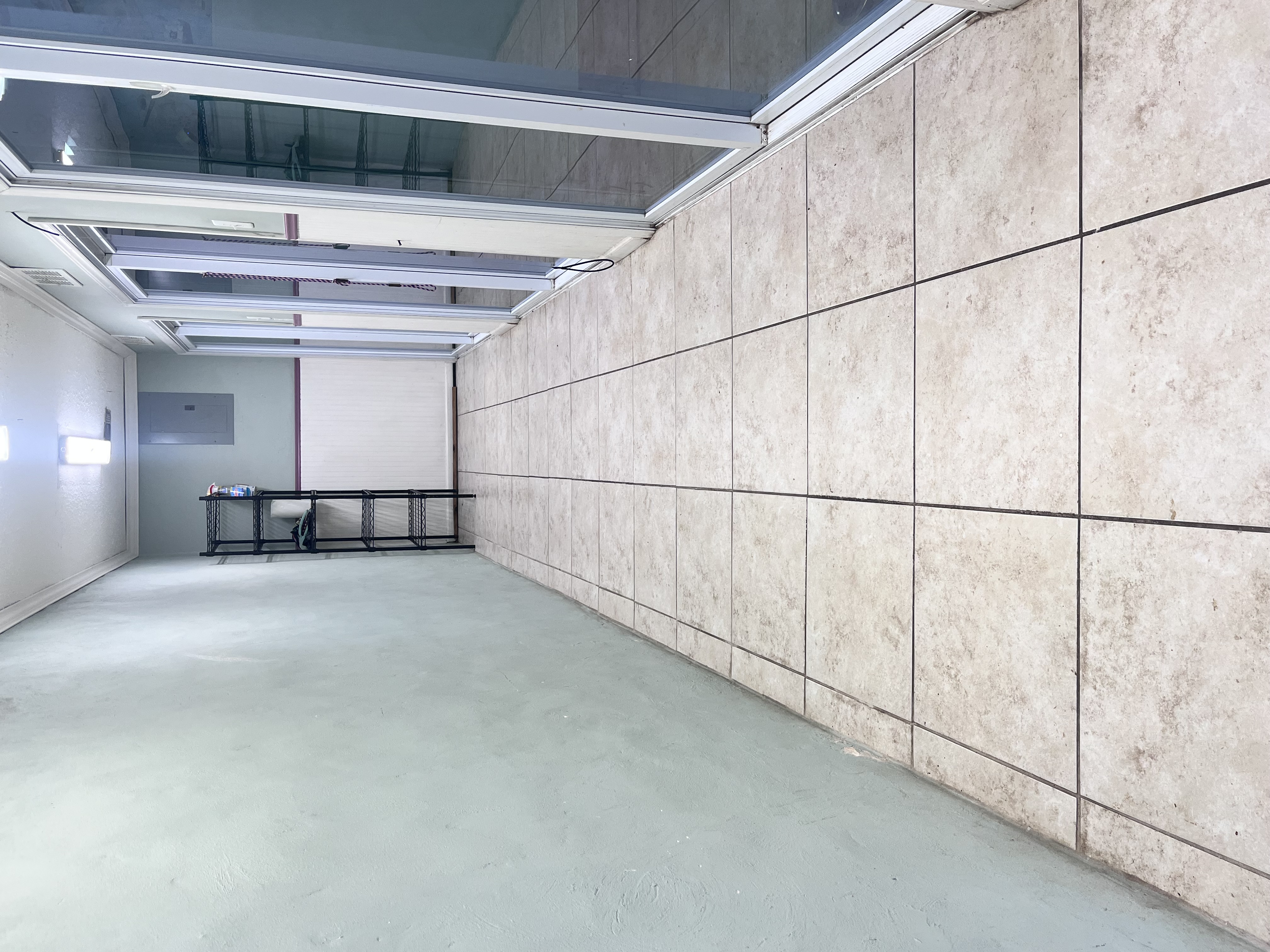 An external shot of the suites, glass door all lined up in a row